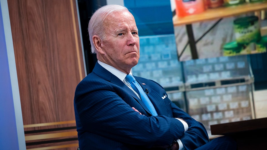Biden frowns at WH press conference