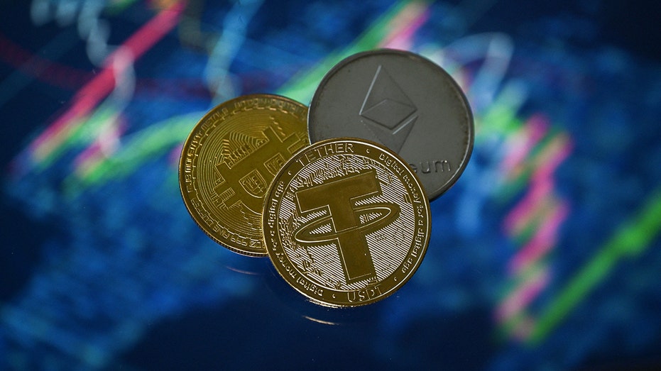 Cryptocurrency coins on a stock market graph background