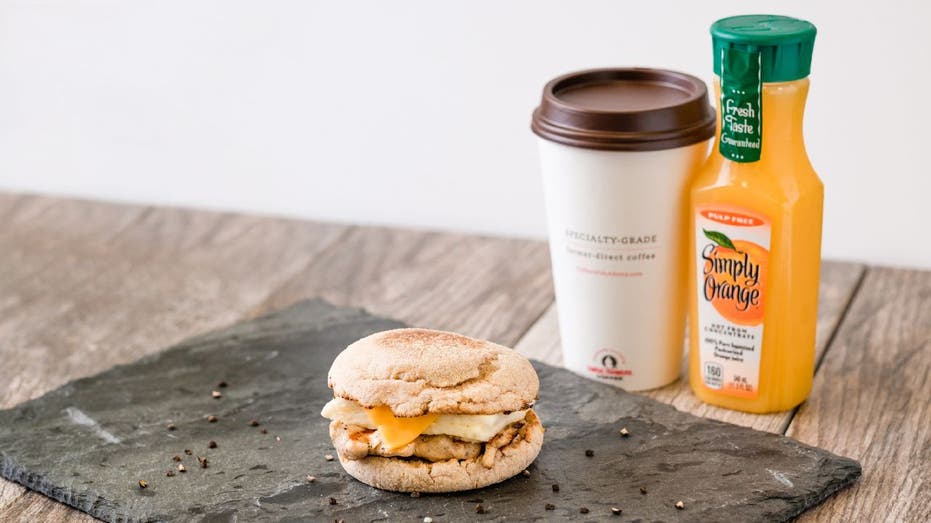 Chick-fil-A breakfast Egg White Grill sandwich with coffee and juice
