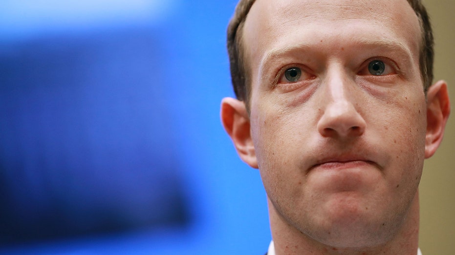 Facebook Chairman and CEO Mark Zuckerberg frowning