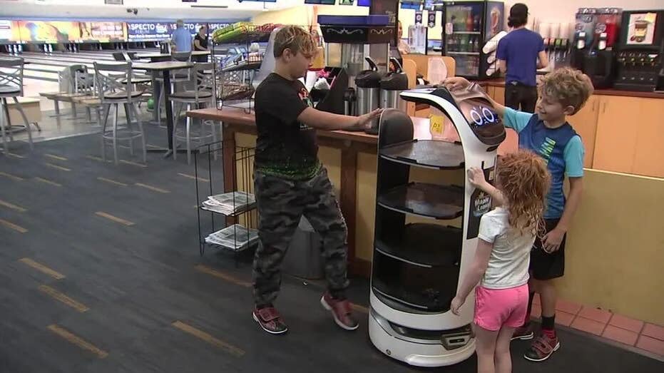 Children interact with a robot