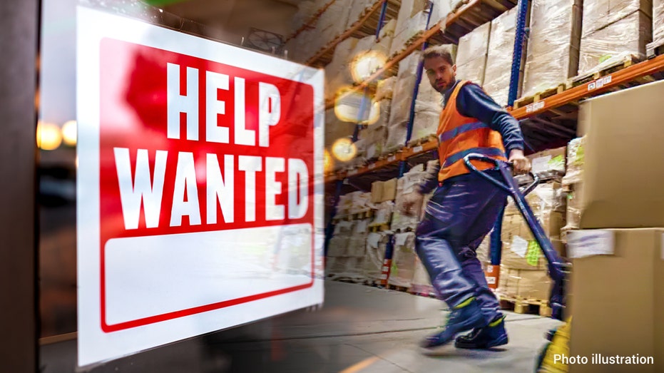 Warehouse worker with help wanted sign