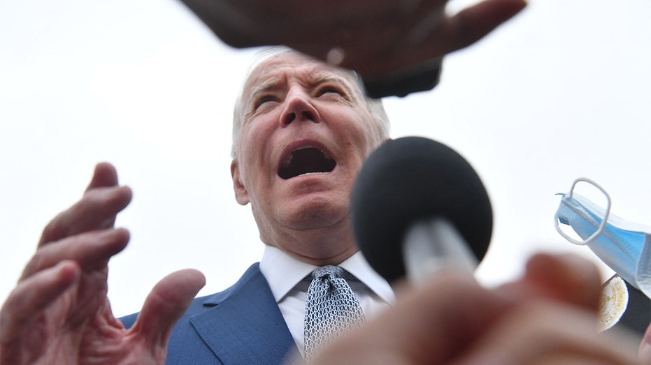 President Biden speaks to reporters at Joint Base Andrews