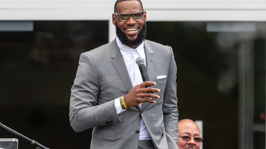LeBron James smiling with mic