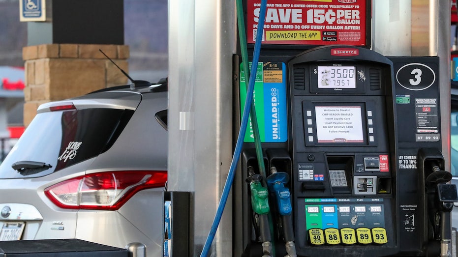 Car filling up gas tank at Sheetz