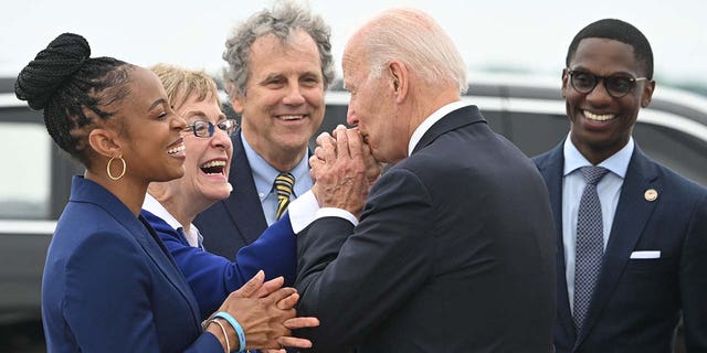 President Joe Biden is greeted by Rep. Shontel Brown, left, Rep. Marcy Kaptur, Sen. Sherrod Brown and Cleveland Mayor Justin Bibb at Cleveland Hopkins International Airport in Cleveland on July 6, 2022.