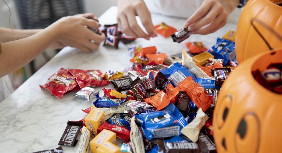 Kids sort through candy