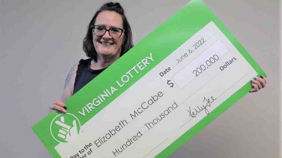 Elizabeth McCabe and her lottery check