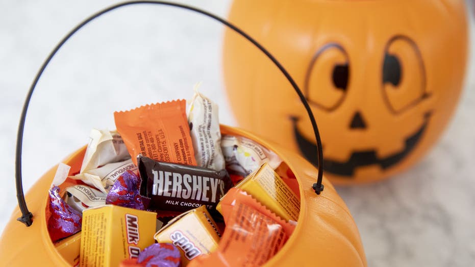 Halloween candy in trick-or-treat bucket