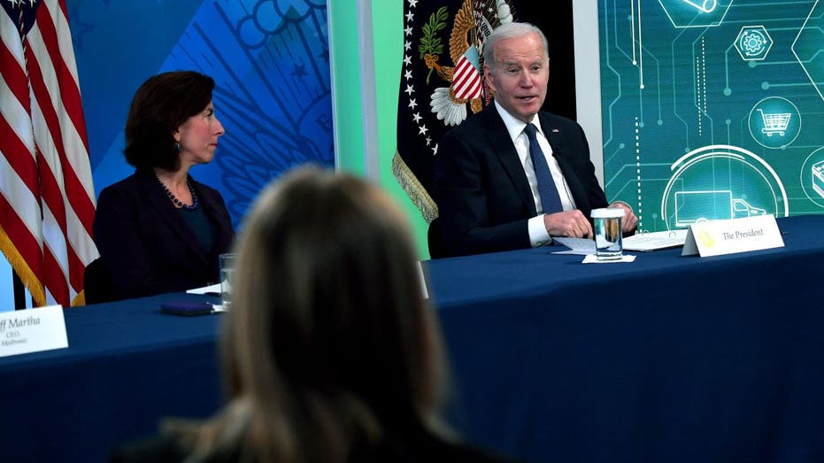 Secretary of Commerce Gina Raimondo and President Biden