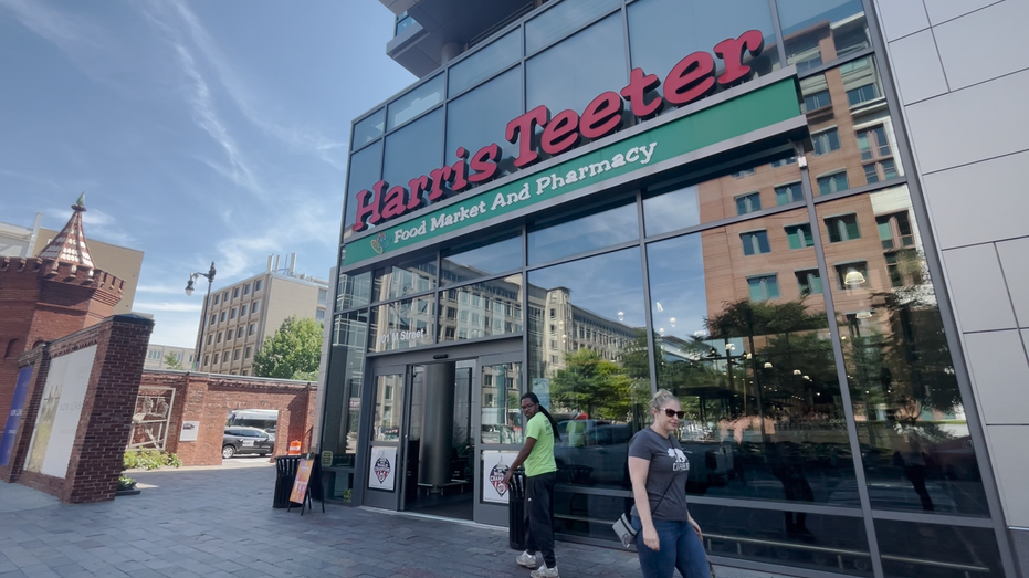 Shoppers enter grocery store