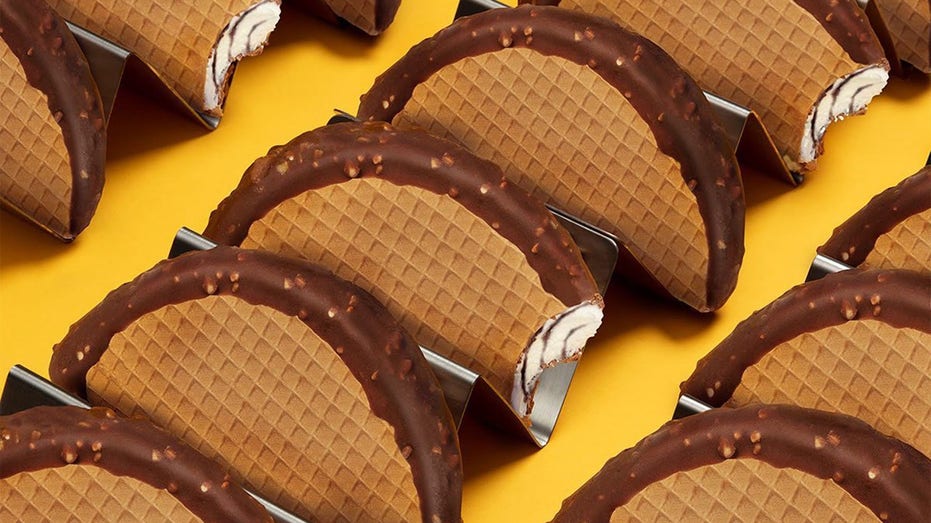 Several Choco Tacos are pictured on a yellow background