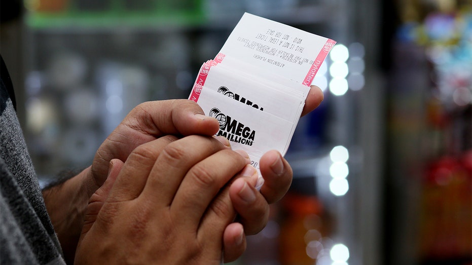 Mega Millions lottery tickets are seen in New York City