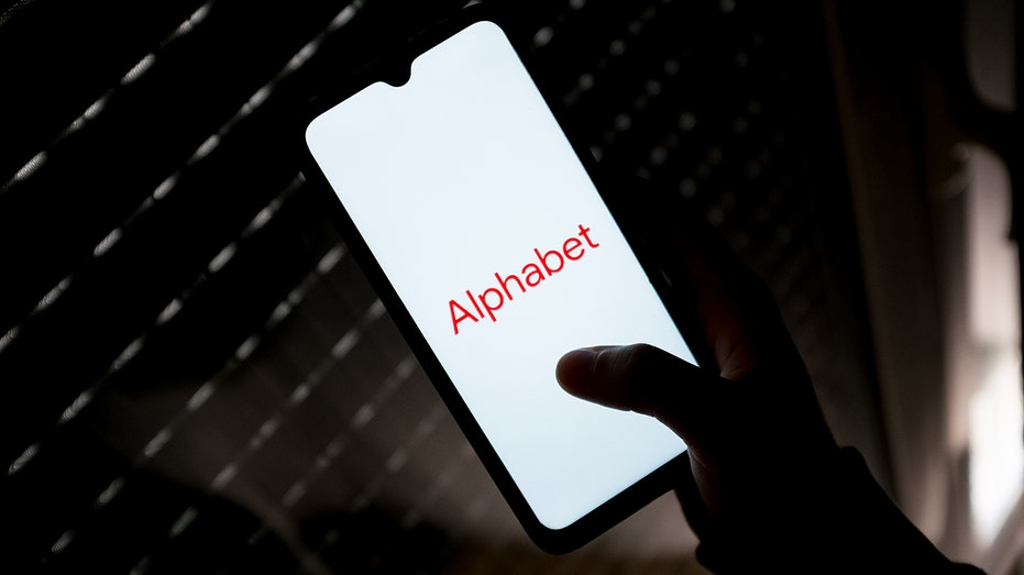 The Alphabet logo on a smartphone