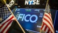 A monitor displays Fair Isaac Inc. (FICO) signage on the floor of the New York Stock Exchange (NYSE) in New York, U.S., on Friday, Oct. 20, 2017. The&nbsp;dollar&nbsp;climbed,&nbsp;Treasuries&nbsp;fell and&nbsp;U.S. stocks headed for a sixth straight weekly gain on bets Donald Trump was closer to pulling off a tax overhaul&nbsp;after the Senate approved a&nbsp;budget&nbsp;vehicle for tax cuts. 