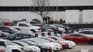 Tesla is in the hotseat as 2 US law makers ask for a breifing on their probes into Tesla safety concerns. Pictured: Teslas parked outfront of Tesla Inc&apos;s U.S. vehicle factory in Fremont, California, U.S., on March 18, 2020.
