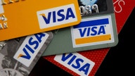 Visa profit jump, boosts dividend, shares rise
