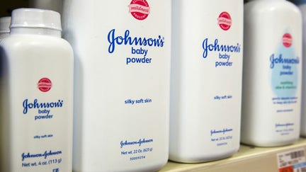 FILE PHOTO: Bottles of Johnson &amp; Johnson baby powder line a drugstore shelf in New York October 15, 2015. REUTERS/Lucas Jackson