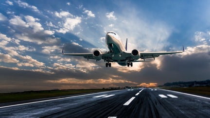 airplane-jet-taking-off-runway