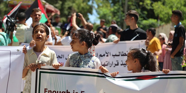 Gaza could face blackouts if the Israeli blockade is not lifted in the next 48 hours. Here, Palestinians protest the 55th anniversary of Israel's capture of Gaza outside the headquarters of the United Nations Educational, Scientific and Cultural Organization in Gaza City on June 14, 2022.