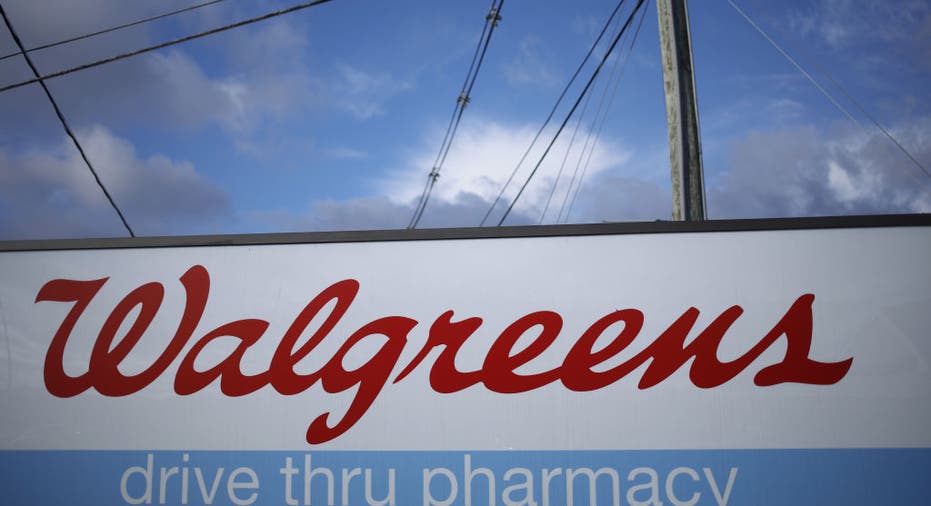 Signage for a Walgreens pharmacy drive thru