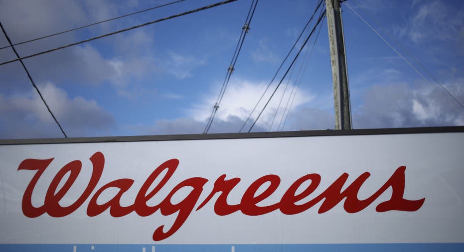 Signage for a Walgreens pharmacy drive thru