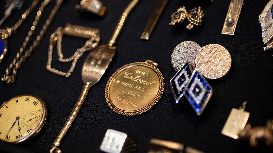 Elvis Presley jewelry, guitar up for auction