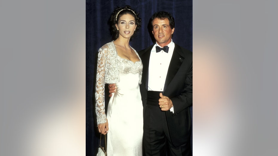 Jennifer Flavin and Sylvester Stallone dressed up