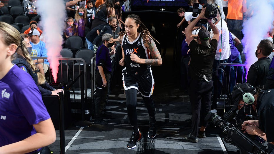 Brittney Griner runs of the tunnel for the Phoenix Mercury