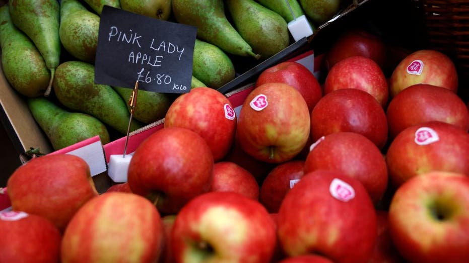 Conference pears and Pink Lady apples for sale