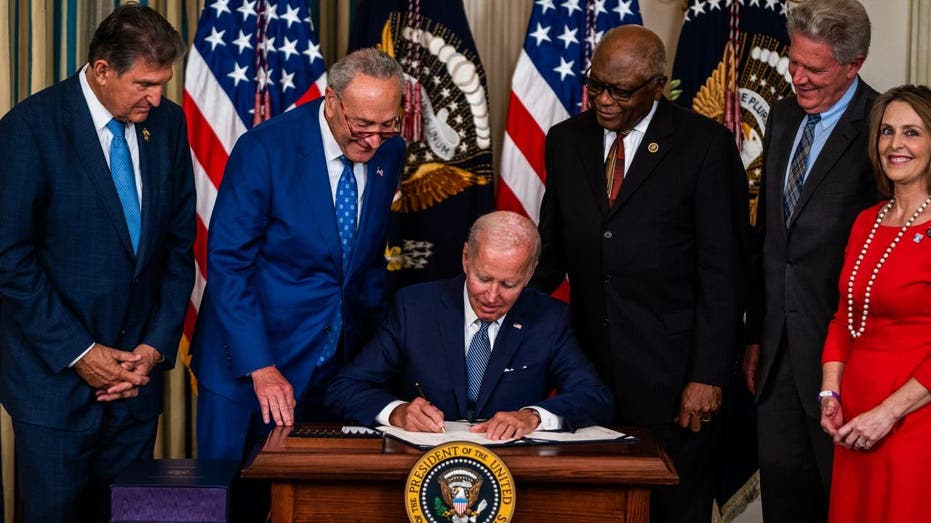 Biden signs inflation-reduction bill
