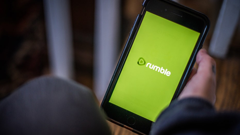Rumble logo on smartphone