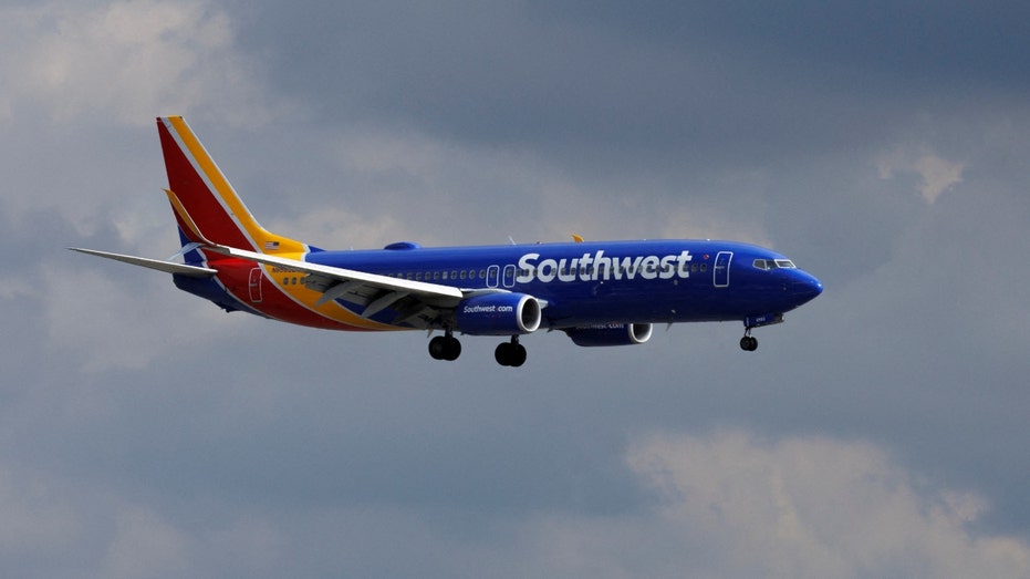 Southwest Airlines commercial aircraft in the air