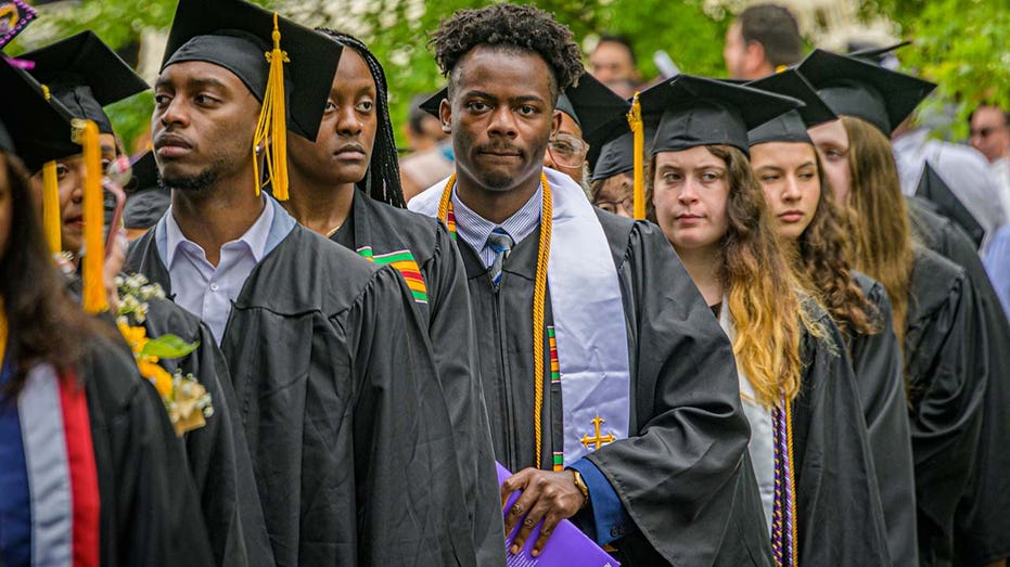 Graduate students in the class of 2022 are seen in New York City