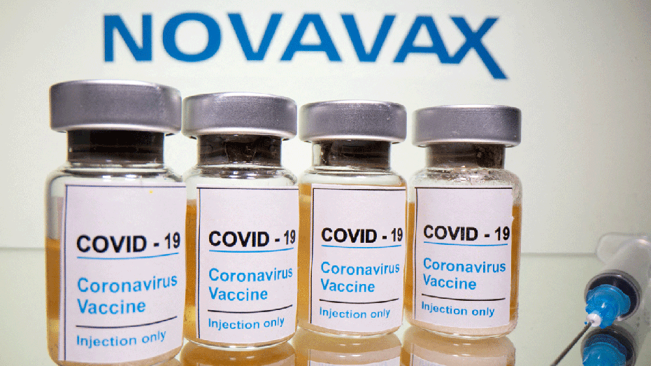 Novavax vaccine vials with a syringe and Novavax logo in the background