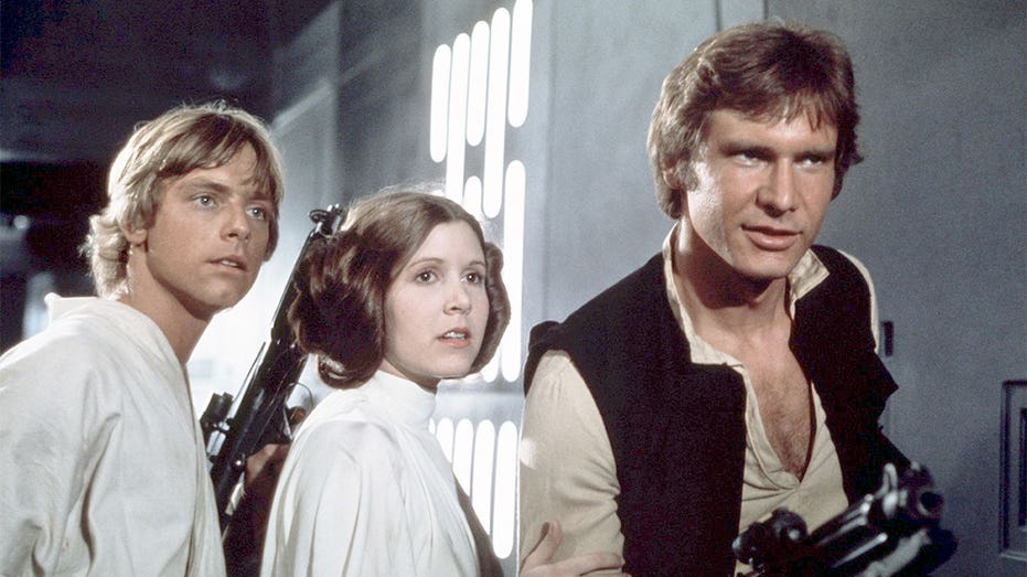 Mark Hamill, Carrie Fisher and Harrison Ford on the set of "Star Wars: Episode IV - A New Hope"