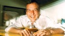 Jim Koch, brewer for Samuel Adams, relaxes with a glass of his MMM Millennium ale in San Francisco on November 17, 1999.