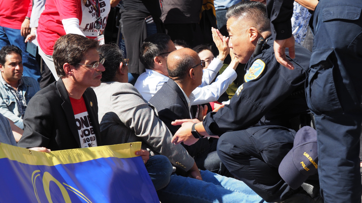 San Francisco airport workers ‘arrested and cited’ after ‘civil disobedience’ San Francisco airport workers ‘arrested and cited’ after ‘civil disobedience’