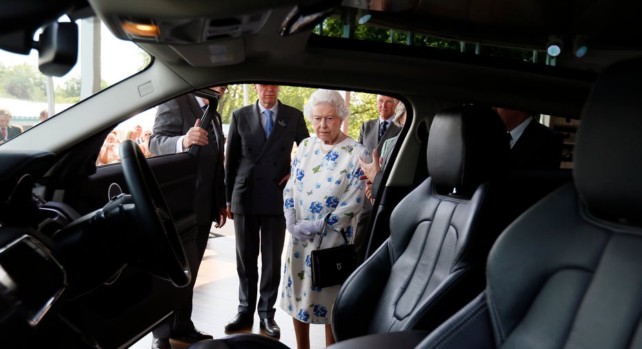 Queen Elizabeth looking at a Range Rover