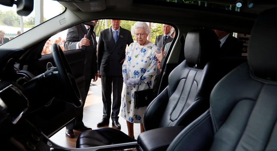 Queen Elizabeth looking at a Range Rover