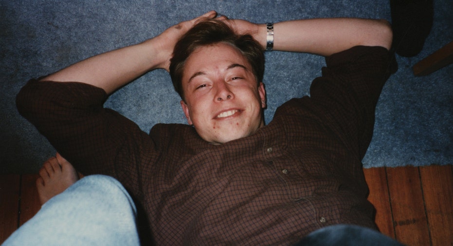 Elon Musk laying on floor of college dorm