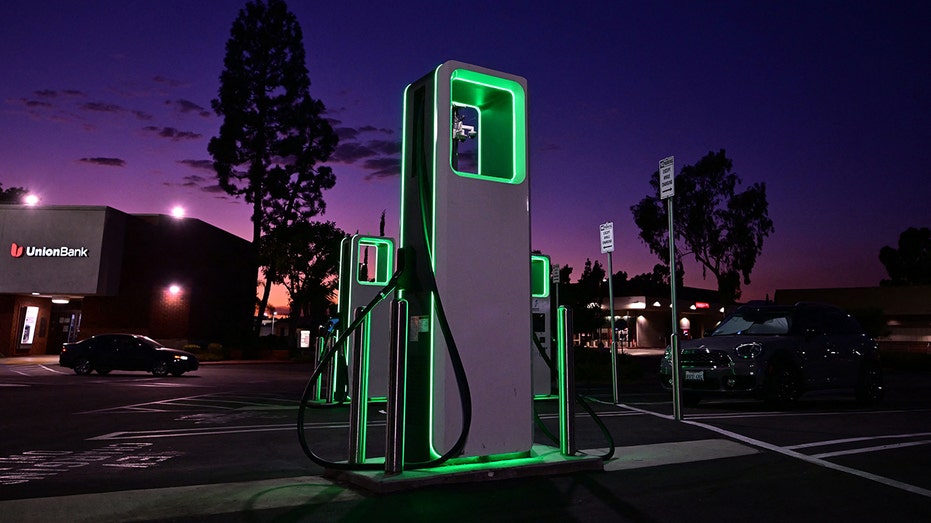 Electric vehicle charger at night