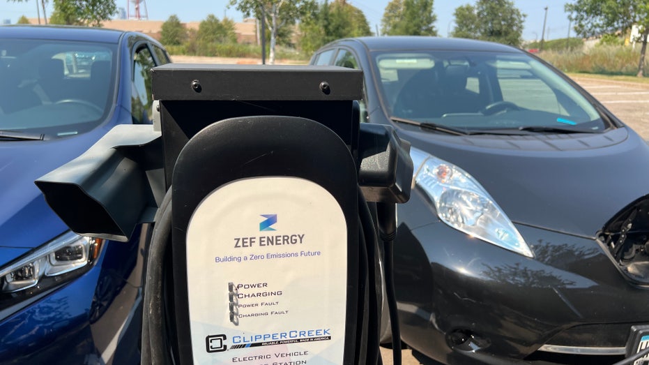 Two electric cars charging
