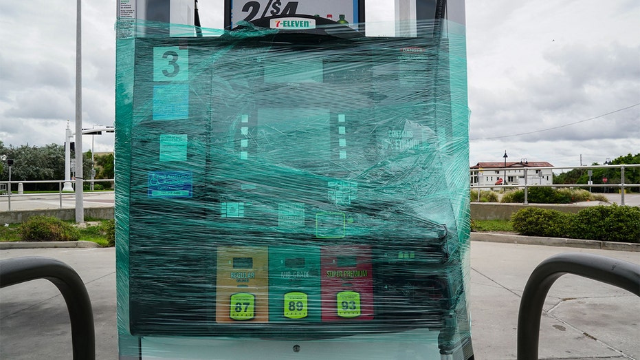 A Florida gas station is cordoned off ahead of Hurricane Ian's landfall