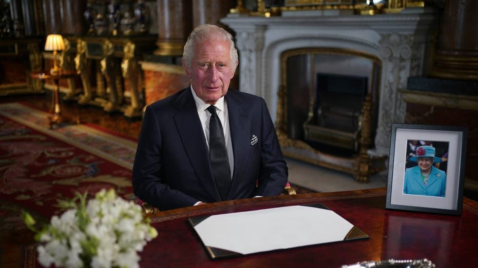 King Charles at a desk