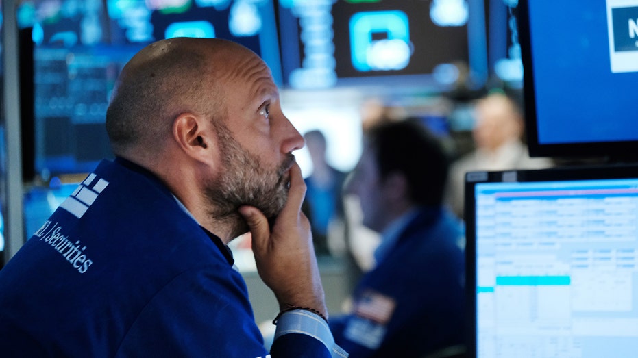 Trader monitors US stock market