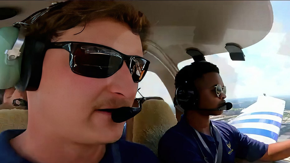 Students flying airplane