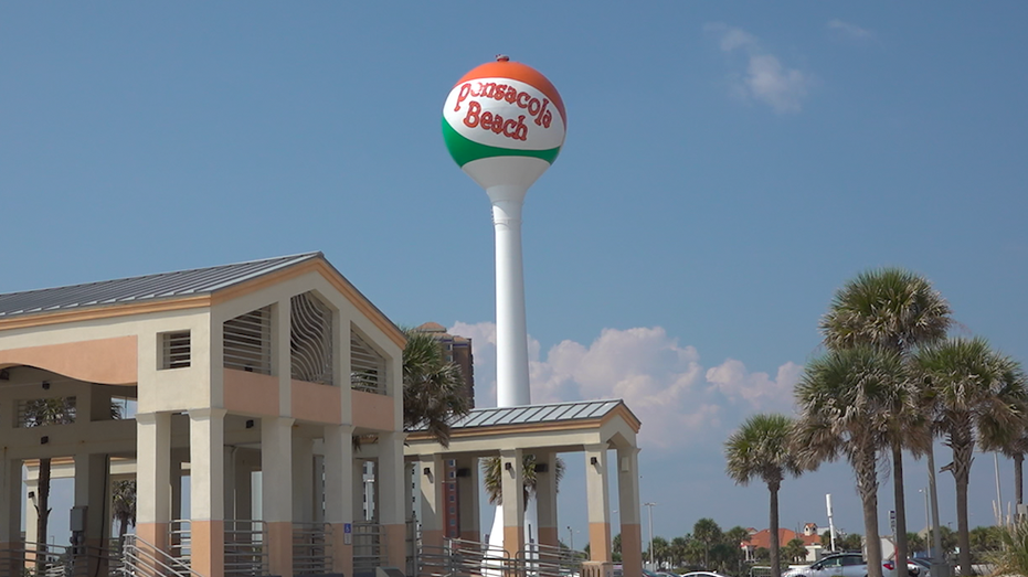 View of the Pensacola beach gazebo with the water tower pensacola beach ball in the distance