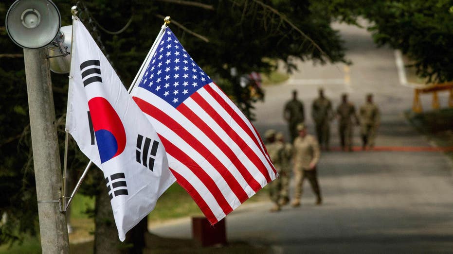 American and South Korean flags