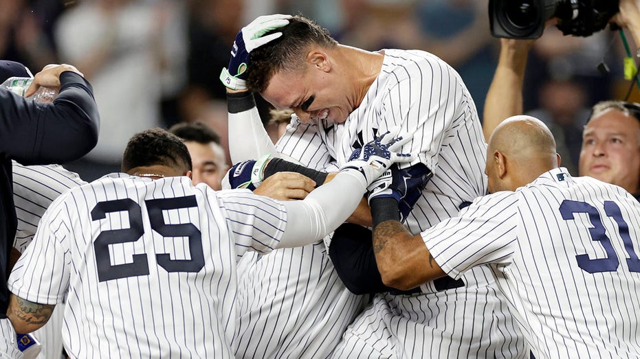 Aaron Judge mobbed after walk off